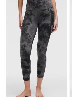 Lululemon high-rise leggings in a navy/indigo tie-dye or cloud-wash pattern